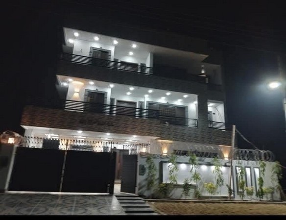 1-Kanal Designer Residence at night, C Block, LDA Avenue, Lahore